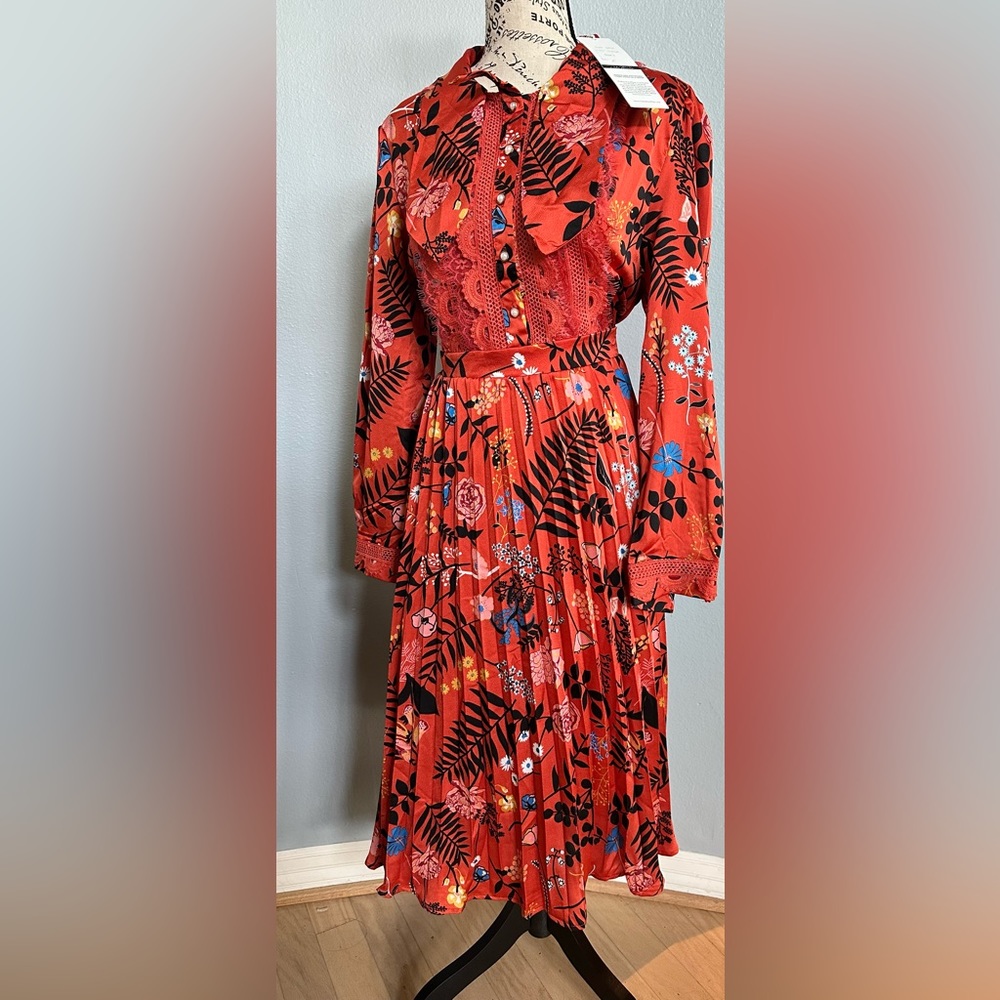 Orange patterned pleated dress